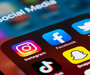 Social media app icons on a phone screen